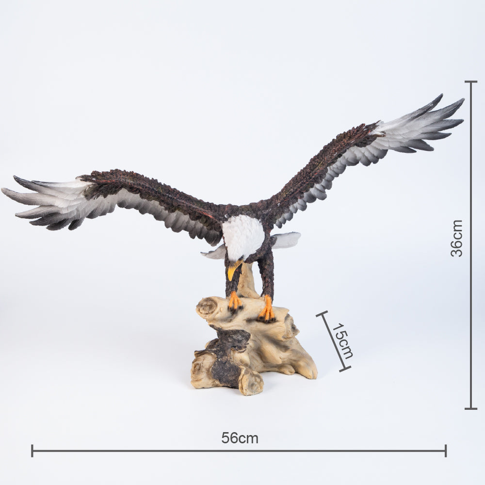 81033799 Decorative statuette - Eagle in flight over rocks